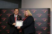 Debbie Haw is presented with The Sarojin's Responsible Thailand Award for the Hotel category.