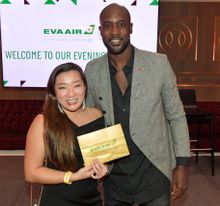 Carlton Cole, West Ham Legend (right) presenting some of the 25 prizes at EVA Air’s Evening Reception. 