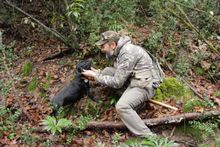 Truffle hunter and his dog 