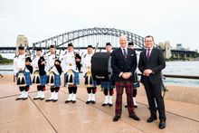 L-R: Royal Edinburgh Military Tattoo pipers and drummers with the Producer and CEO Royal Edinburgh Military Tattoo, Brigadier David Allfrey, MBE; and Minister for Tourism and Major Events, Adam Marshall MP