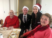 Peter Kennison and Kathleen Fletscher with Sheraton Melbourne staff