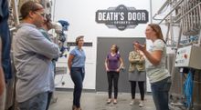 Go behind the scenes at one of Madison's favorite distilleries at the Death's Door Essential Madison Experience.