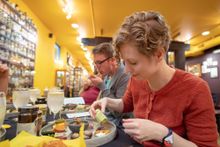 Tasting the many mustard bites at the National Mustard Museum Essential Madison Experience. 