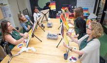Painting a Madison icon at the Wisconsin Union Essential Madison Experience. 