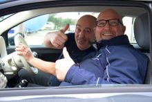 Phil Jones, of Cartwright Travel and Passion for Cruises, receives the Fiat 500 from Mike Evans, Head of Sales at Fred. Olsen Cruise Lines. Picture: Fred. Olsen Cruise Lines