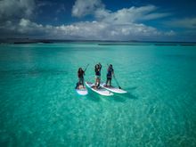Claire, Dhafy, and Saazu practicing for their expedition