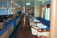 Sit back with your cup of coffee and enjoy the view of the ocean as you sail via the east coast and across Bass Strait