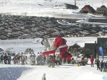 A boarder gets big air in the pipe event.