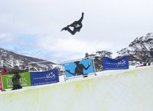 Andrew Burton pulls off a massive grab in the Perisher iPod Super Pipe