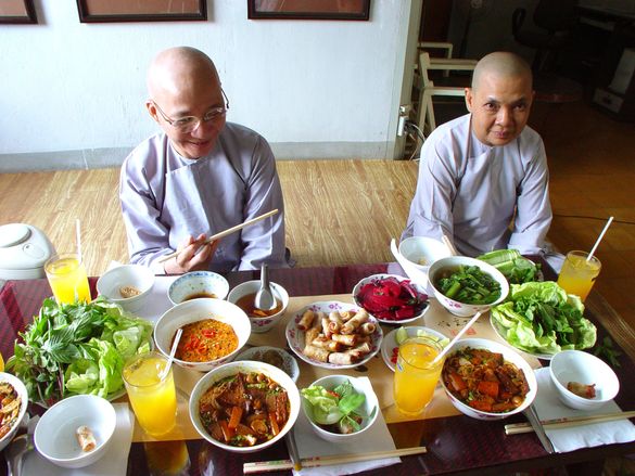 Buddhist nuns serve lunch after private calligraphy lesson
