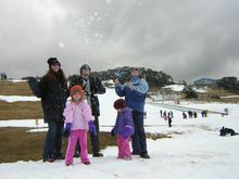 The Brown family from Wollongong enjoy the snow at Perisher