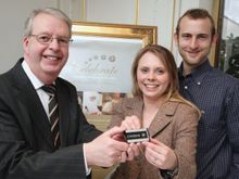 David Curtis-Brignell, Director of Marketing at Millennium & Copthorne Hotels, presents Nicol with her new diamond