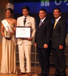 Pictured L � R: Miss Guam Tourism Tiffany de Gracia; Hiroshi Tachi, Ambassador at Large;  Governor of Guam Felix P. Camacho; GVB