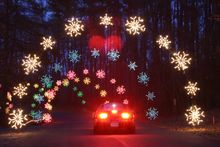 2  Multi-colored snowflake arches provide a kaleidoscope of dazzling color at Celebration in Lights in Newport News Virginia