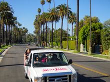 Starline’s 13-passenger vans offering a “topless with headsets” experience get Hollywood visitors as close as possible to the es