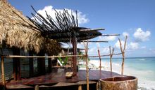 Azulik cabanas with the Caribbean ocean below