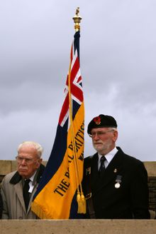 A Veteran and RBL Standard Bearer at Harlebeke Cemetery