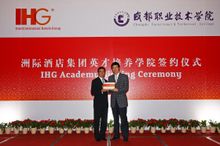 Edmond Ip (left), Chief Advisor, IHG Asia Pacific presented the IHG