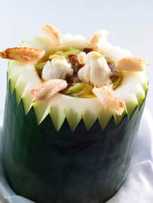 T�ang Court - Double boiled sliced lobster, conpoy, sliced frog, duck and crab meat soup in winter melon