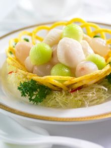 T�ang Court - Saut�ed scallops with lychee and honey dew melon in taro nest
