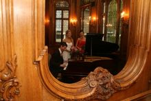 Olympic Suite piano pic through booth
