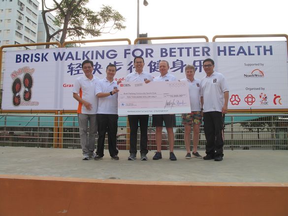 From left to right, Louis Tay of Bukit Panjang CSC, President, Asia of the Travel Corporation  Mr. Nicholas Lim,  Mayor of North