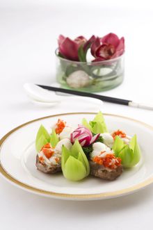 Stewed beche-de-Mer filled with sliced lobster, shrimp paste and topped with crabmeat and crab roe