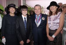 Sir Sol Kerzner celebrating his Royal Knighthood with his family, Vanessa Kerzner, Ty Kerzner and Andrea Kerzner, at Government 