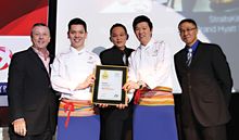 Carousel team receives Best Buffet Restaurant award from Adrian Tay, Editor of AsiaOne