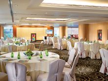 Nathan Room with round table setting and  natural light