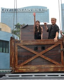 Franz Harary enter into the packing crate with Fiona Sit preparing to wow audience