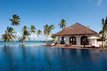 The Residence Zanzibar appropriately complements its breathtaking location, amid a picture-postcard coconut grove on its own mil