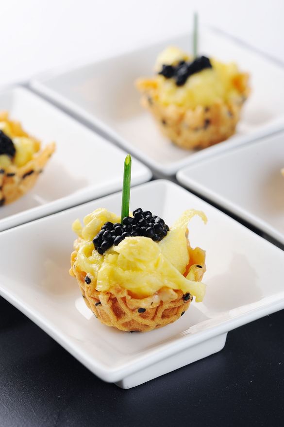 Caviar, poppy seed wafer cones with scrambled eggs