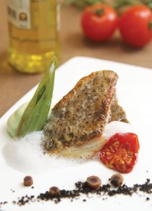 Pan-fried Orbetello Sea Bass with Roman Artichoke Cream, Taggiasche Olive Powder, Semi-dried Cherry Tomato and Baby Fennel, Caro