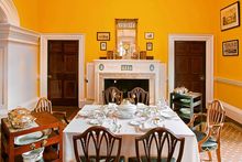  The dining room at Monticello, now painted in the dazzling yellow selected by Thomas Jefferson in 1815. Ralph Lauren Paints cre