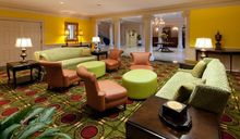 Walls are painted a brilliant Monticello Yellow in the Jefferson Sitting Room at the Wyndham Virginia Crossings Hotel & Conferen