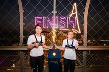 Photo caption: Athletes Wong San San (left) and Ieong Mei Na gave a demonstration of vertical racing up the Eiffel Tower as part of a cocktail launch to announce the second Light The Night Run event. 