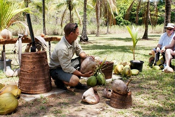 Carl Johanson and a coconut Copyright_Coconut Odyssey Thala Beach Lodge