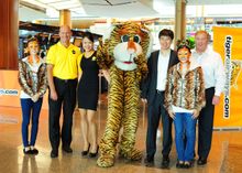 from left to right, are Campbell Wilson (CEO of Scoot), Koay Peng Yen (Tiger Airways' Group CEO) and Stewart Adams (Tiger Airway