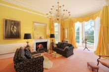 The Main Living Room, Which Comes With Flatscreen TV, Is Bathed In Light From The Floor To Ceiling Picture Windows That Overlook