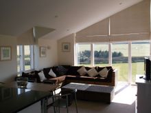 Inside, This Handsome Elevated Bolthole Has A Large First Floor Open Plan Living, Kitchen And Dining Area With Direct Access To 