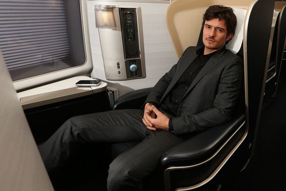 Orlando Bloom, seated in British Airways First, will be in Sydney for a special British Airways event in May