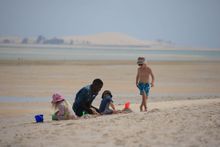 Children Enjoying The Beach On Azura Benguerra