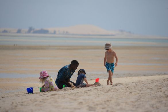 Children Enjoying The Beach On Azura Benguerra