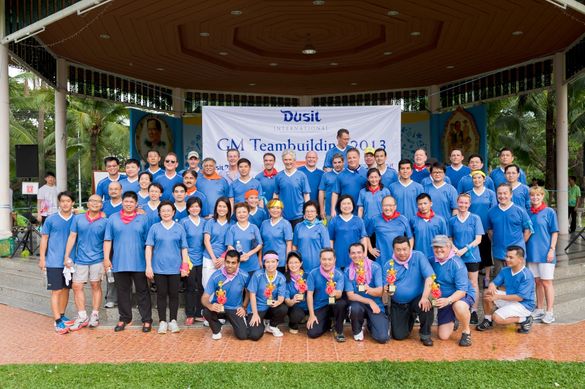 Dusit International’s General Managers and Executives pose for a group photo after a afternoon of team building exercises at Lum