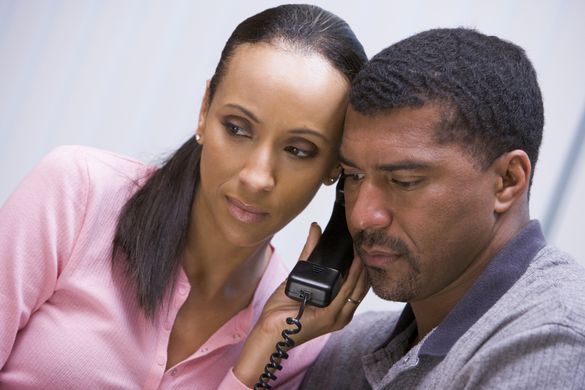 Man & Woman On Phone