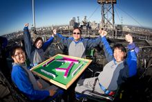 Mahjong Players Celebrate on the Bridge