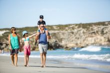 Family walking on beach at Pennington Bay 