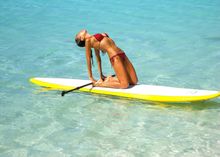Charlotte Piho demonstrates SUP Yoga
