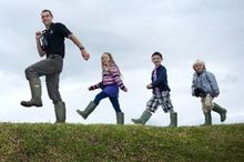 Ranger James Elliott with merry band of klids